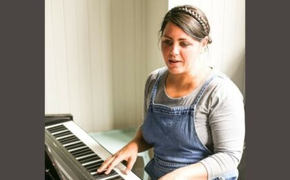 Becky Gilhespie playing piano