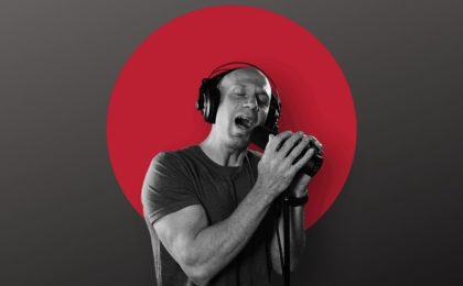 Chris Liepe singing into a microphone
