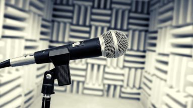 A microphone in a vocal booth