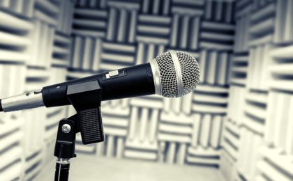 A microphone in a vocal booth