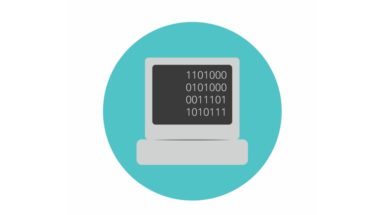 computer screen with binary code