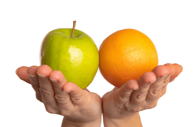 photo of hands holding an apple and an orange