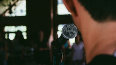 speaker at microphone