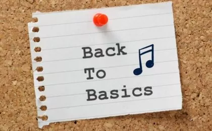 Words "Back to Basics" pinned on a board