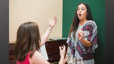 Voice teacher with a student