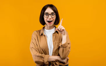 aha photo of a woman with a surprised expression and her finger up