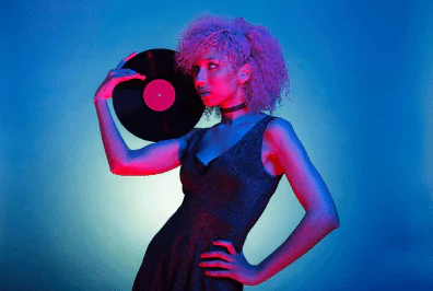 groovy vinyl photo of a woman holding a vinyl record