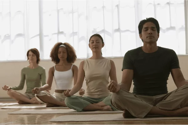 group meditation photo of a group of people meditating