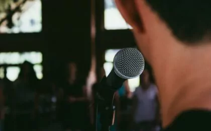 speaker at microphone