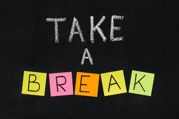 take a break photo of the words "take a break" in chalk and post-it notes